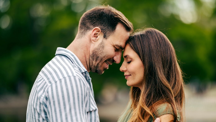 A man and woman hugging